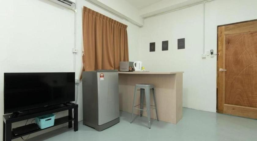 Oyo 43993 Madsuite Kota Kinabalu Extérieur photo